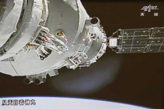 China spacecraft successfully docks in orbit