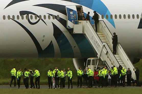 5 from diverted plane claim asylum: UK police