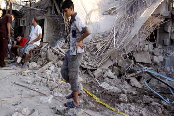 Suicide bombers target Baghdad mosque, killing 26