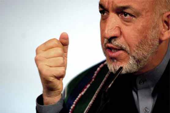Karzai suspends talks with US over Taliban move 