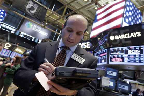 Stocks edge lower as investors wait for the Fed