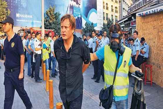 Police detain 13 more in raids in Turkey