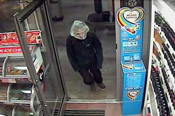 Man robbed gas station wearing a clear plastic bag