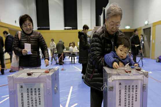 Voting starts in closely watched Tokyo election