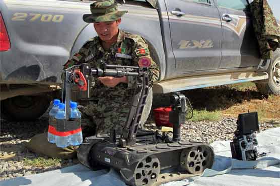 Afghans rush to learn art of defusing bombs