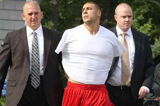 Pro football player Hernandez charged with murder 
