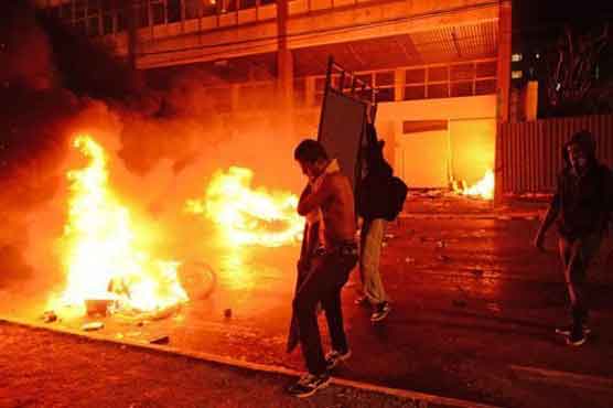 Brazil protesters, police clash near match