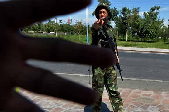 China "terrorists" riot in latest Xinjiang clash: report 