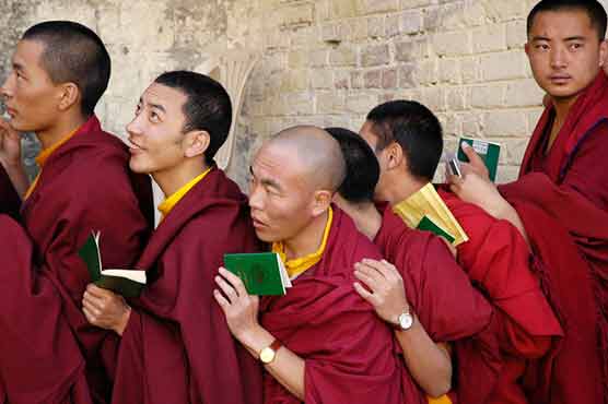 China rebukes monastery at heart of fiery protests 