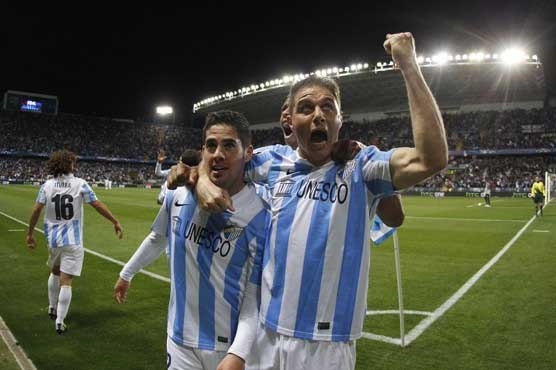 Malaga through to Champions League quarter-finals   
