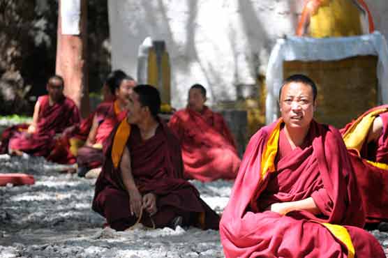 Tibetan monk self-immolates inside China temple