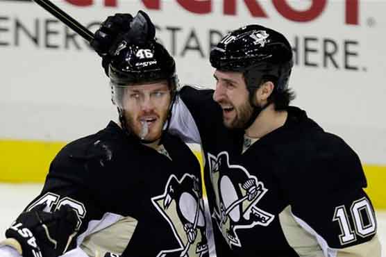 Penguins beat Bruins 2-1 to run win streak to 9 