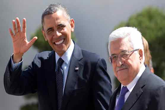 Obama warmly greeted by Abbas