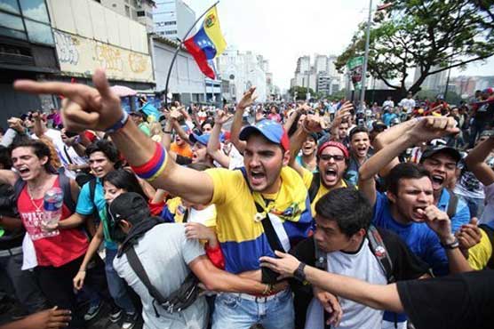 Chavez backers clash with protesters in Venezuela