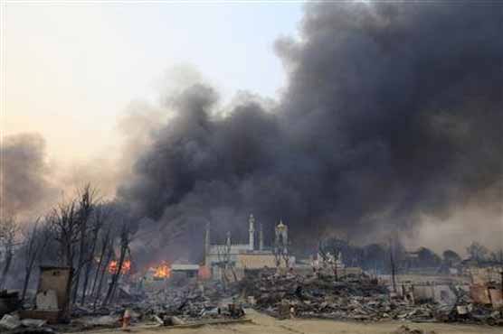 Bodies lay unclaimed in riot-hit Myanmar streets