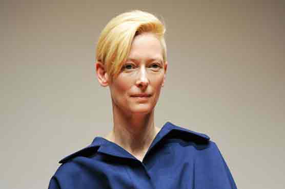Tilda Swinton performs art of sleeping in NYC