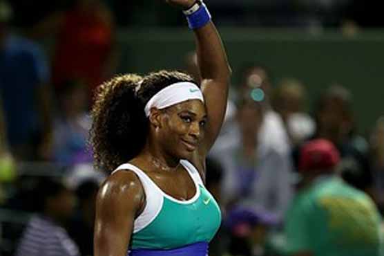 Serena Williams rides bicycle to match 