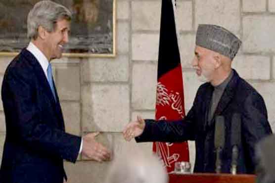 Kerry and Karzai strike upbeat note in Kabul