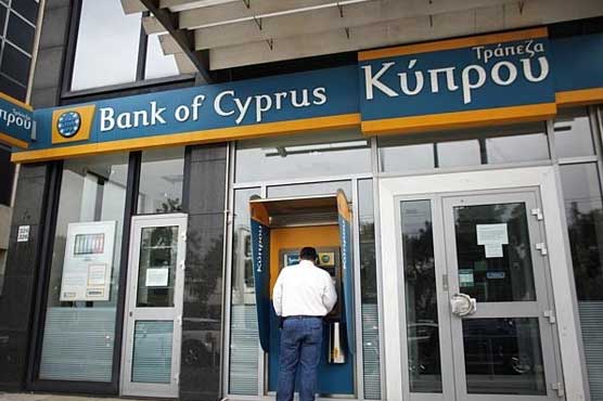 Cyprus banks to reopen today with tight controls 