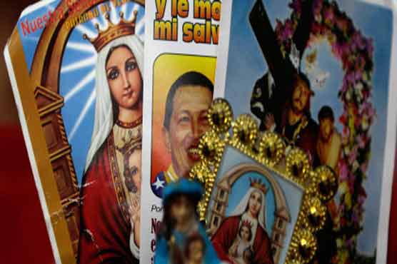Chavez's legacy gains religious glow in Venezuela
