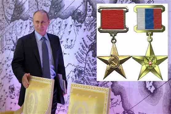 Putin gives Hero of Labour awards to Russians