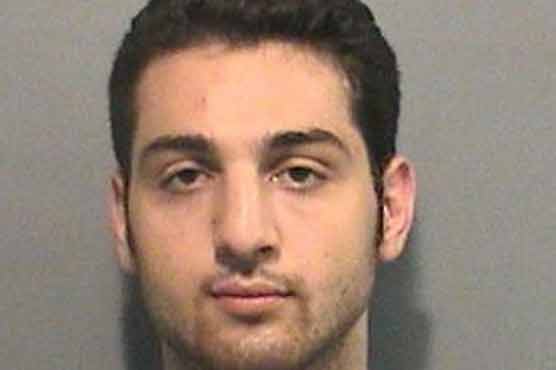 Boston bomb suspect died of gunshots, blunt trauma