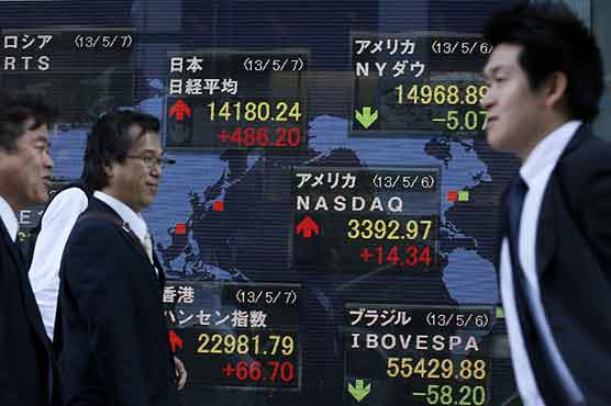  Asian stocks mixed, Tokyo soars high 