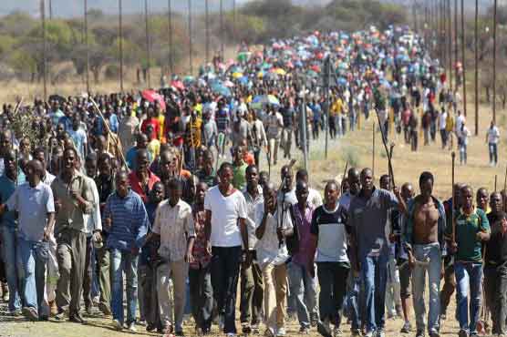 Thousands of miners go on strike over leader’s killing