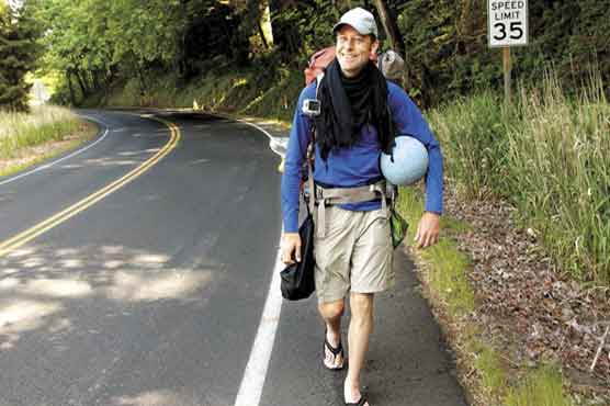 Man dribbling soccer ball to Brazil dies in accident