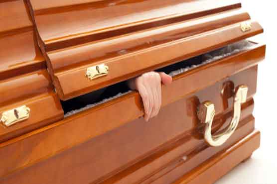 Zimbabwean 'dead man' wakes up during funeral