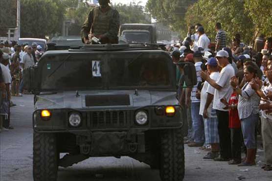Besieged Mexican town rescued by soldiers