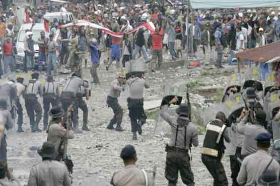 Indonesian miners go on strike for probe into mishaps