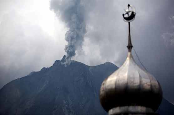 Indonesia volcano erupts again, forces evacuations