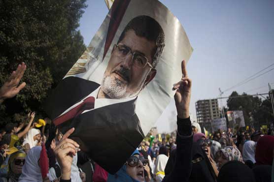 Morsi arrives in court to face charges