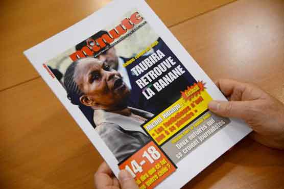 France to probe Magazine for painting black minister as monkey 