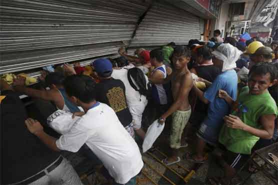 Philippines: Looting, gunfire break out in typhoon-hit city