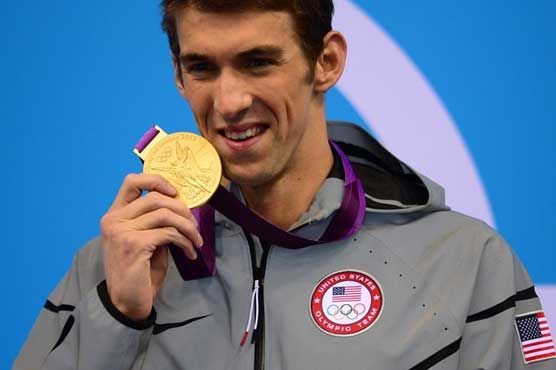 Swimming: Phelps back in drug test programme