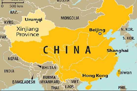 China says 11 killed in assault on police station