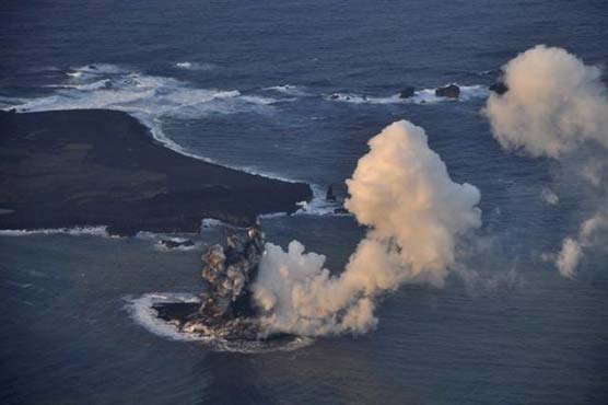 Volcano raises new island far south of Japan