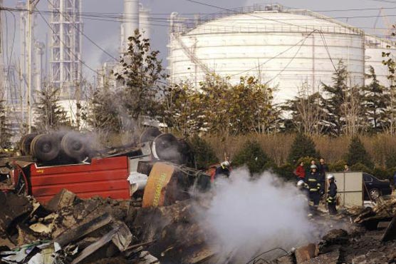 Death toll in China oil blasts rises to 52