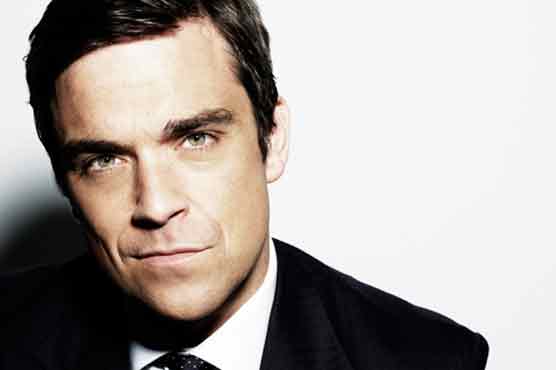 Robbie Williams grabs top spot in UK album charts