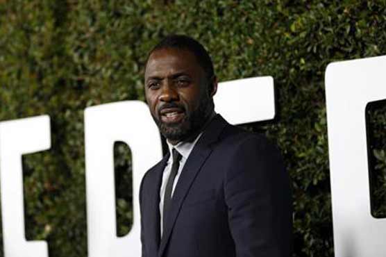 Elba mines Mandela's 'commanding presence' in biopic role