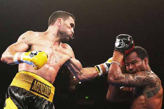 Mundine eyes Mayweather after beating Mosley 