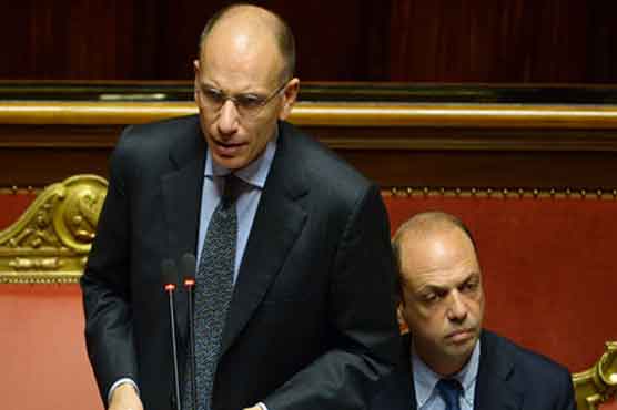 Italy PM survives vote after Berlusconi about-face
