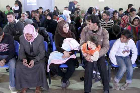 France offers right to asylum to 60 Syrians