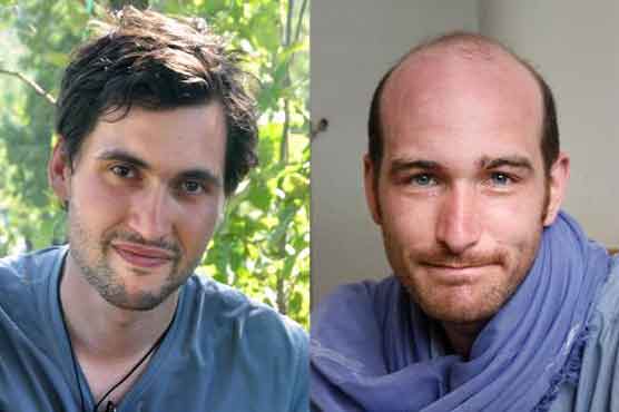 France identifies two more reporters held in Syria