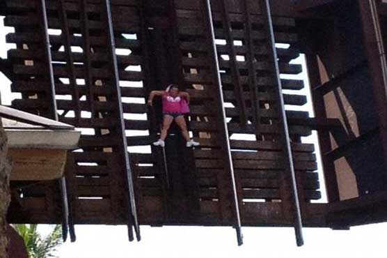 Woman trapped on opening bridge 