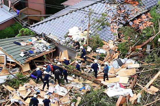 Typhoon, mudslides kill 14 in Japan; 50 missing