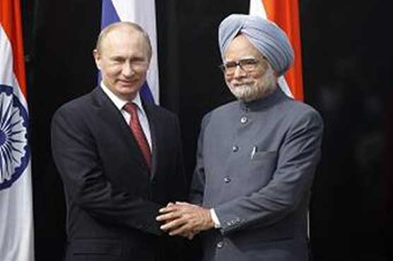Manmohan meets Putin for nuclear, arms talks 
