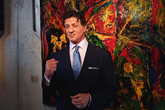 Action star Stallone shows off artistic side in Russia